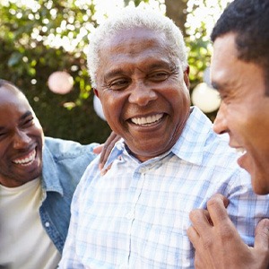 Patient in Phoenix laughing confidently with family