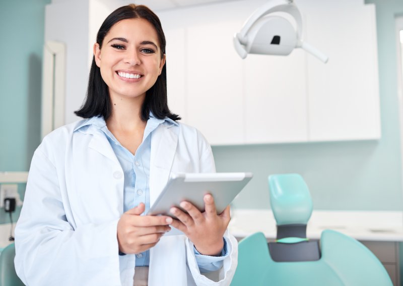 Dentist smiles at patient
